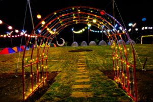 Pawna Lake Camping quotation page – campsite night view with lights