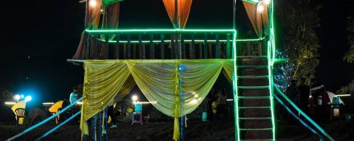 Decorated tent with lights at Pawna Lake campsite